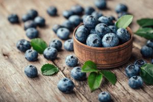 Blueberries in a small brown basket