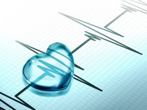 Graphic of clear heart shape over pulse monitor.