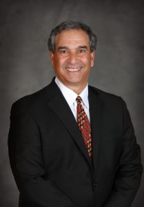 Headshot of Leon J. Khoury