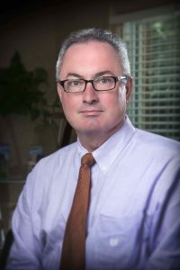 Headshot of Mark Shelley