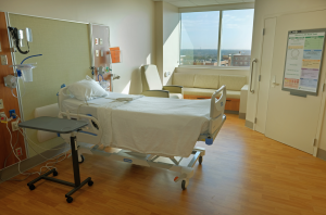 Hospital room with bed and machines