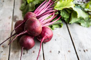 Beets on a wood surface