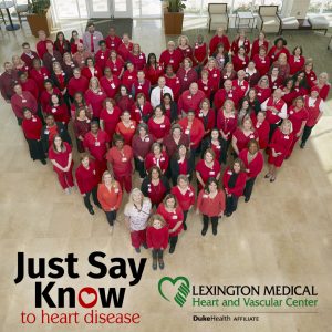  "Just Say Know to heart disease" flyer of hospital employees in red scrubs standing together to form a heart shape