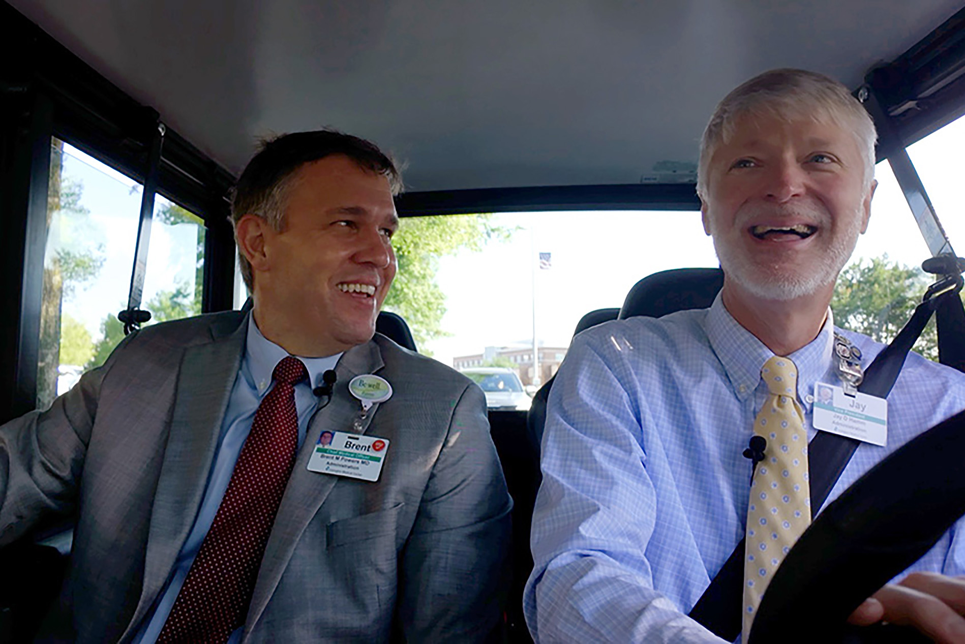 Brent Powers, MD, CMO, and Jay Hamm, VP, in patient shuttle