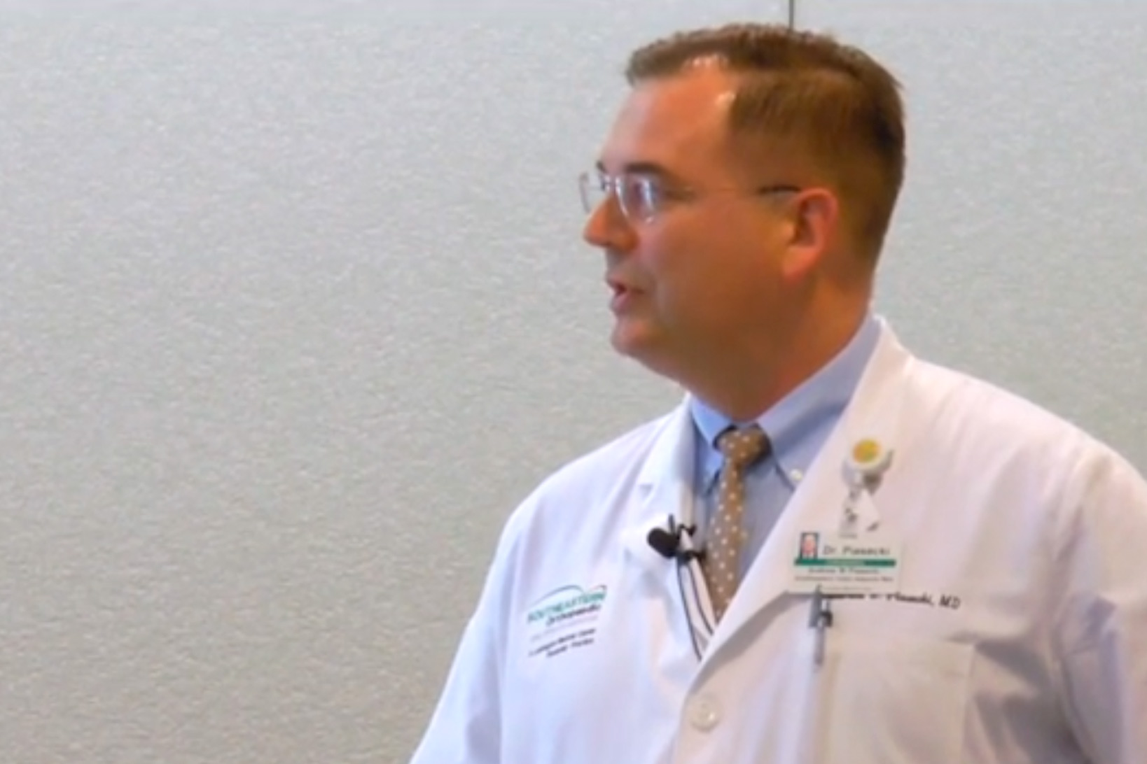 Physician Lecture Series – Andrew W. Piasecki, M.D_ Andrew Piasecki speaking to someone off to his right.