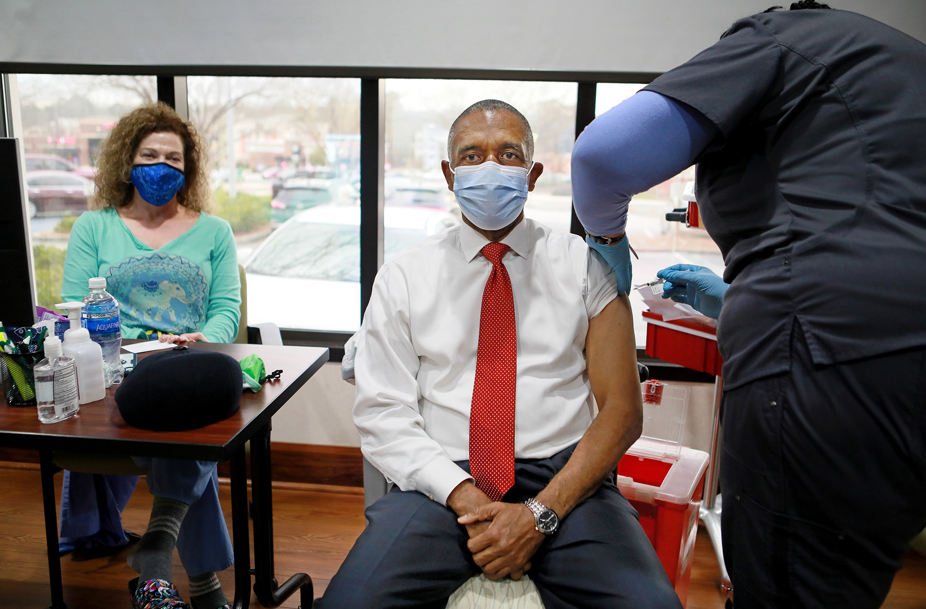 Rev. Charles Jackson Sr. receiving vaccine