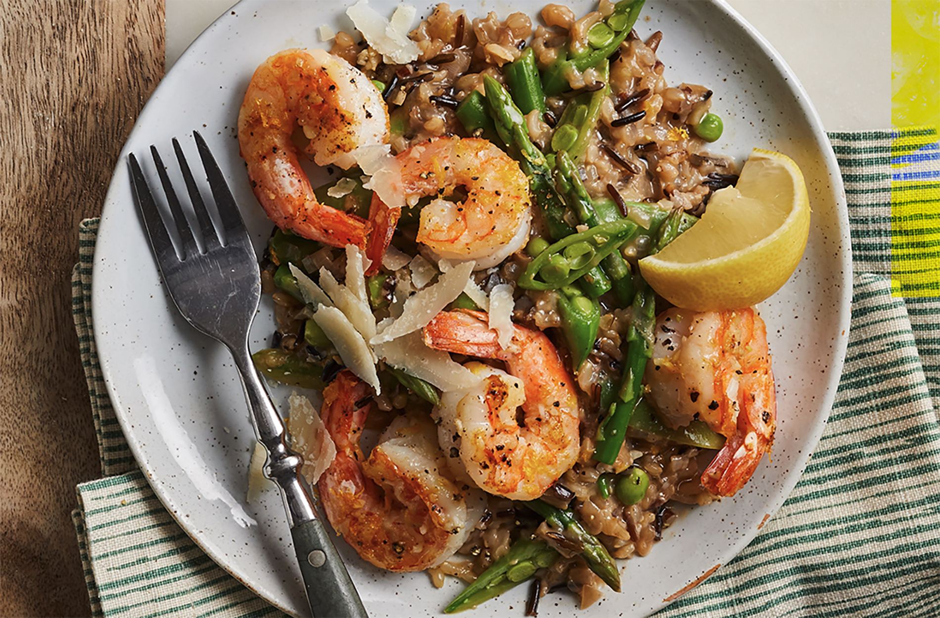 Shrimp and asparagus risotto on plate