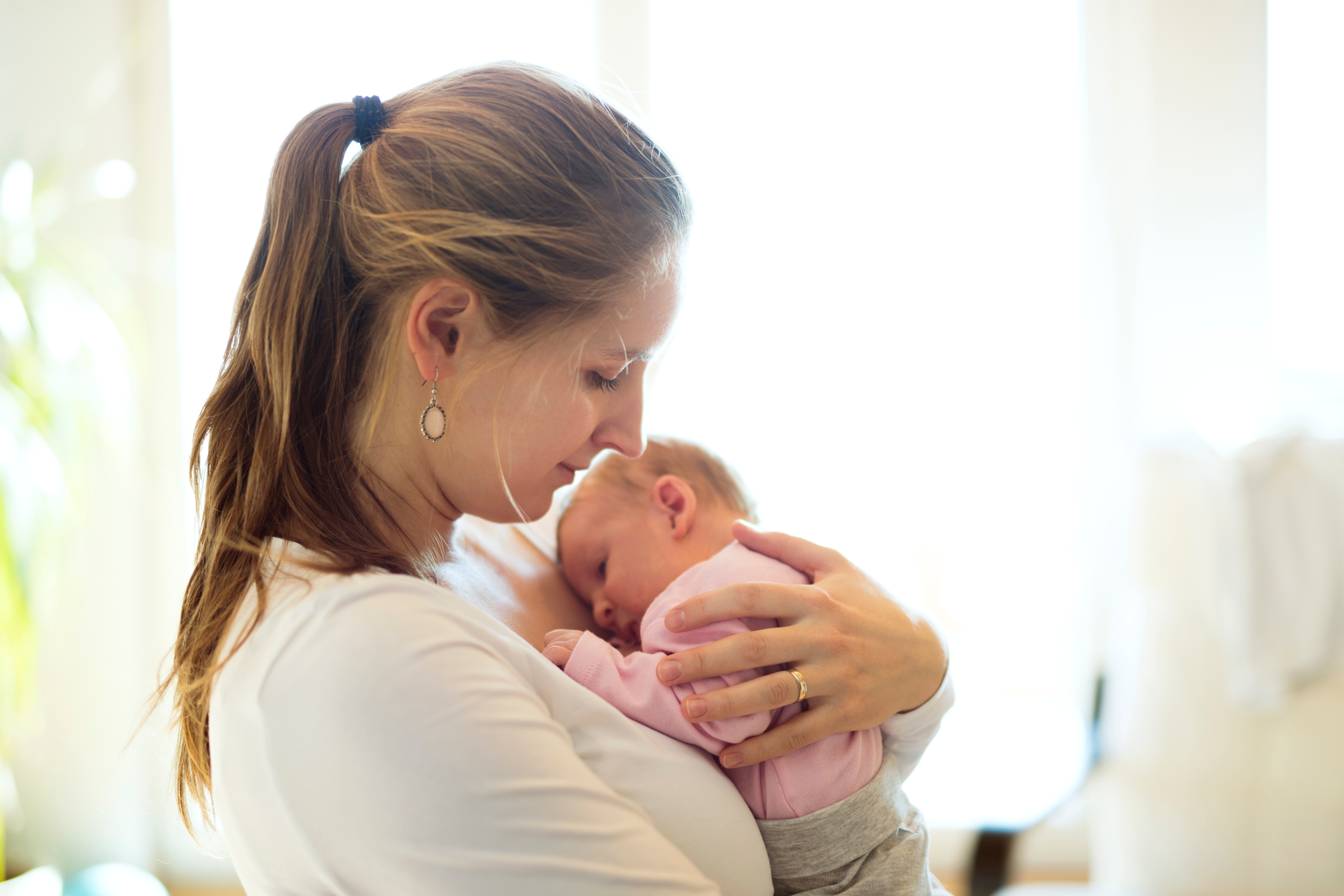 Mother holding newborn baby