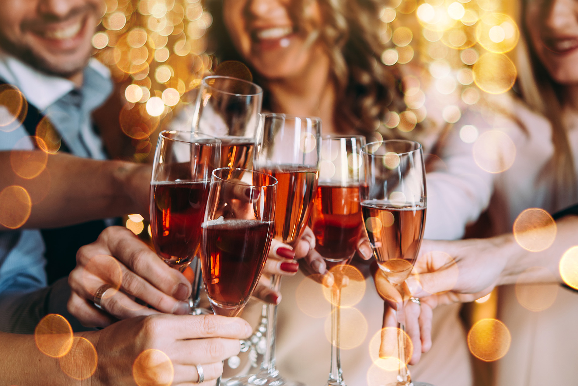Friends toasting with champagne at a holiday party