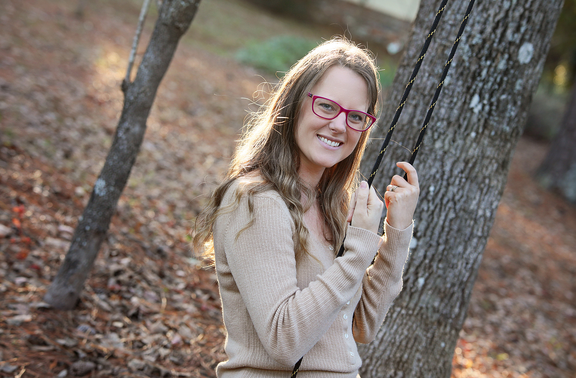 Stacey Rostek outside on swing