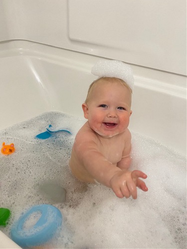 baby in bath tub