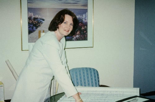 Photo of Barbara Willm in her office in 1998