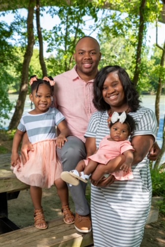 Portrait of Belton family with their children