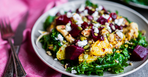 Chicken, beet, feta and corn salad on a plate