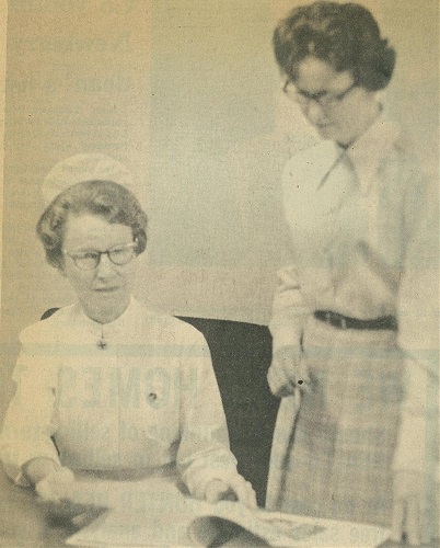 Early photo of Ms. Medhurst with another nurse