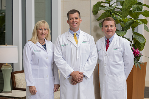 Cardiothoracic surgeons Heather Currier, MD; Jeffrey Travis, MD; and William Yarbrough, MD
