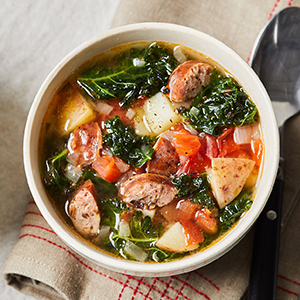 Bowl of sausage and kale stew