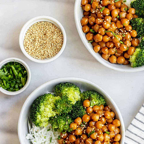 sticky chickpeas in bowl with broccoli and rice