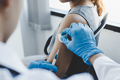 Woman getting flu vaccine