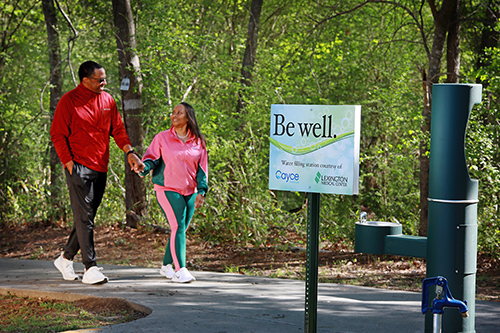 African American couple walking on Timmerman Trail