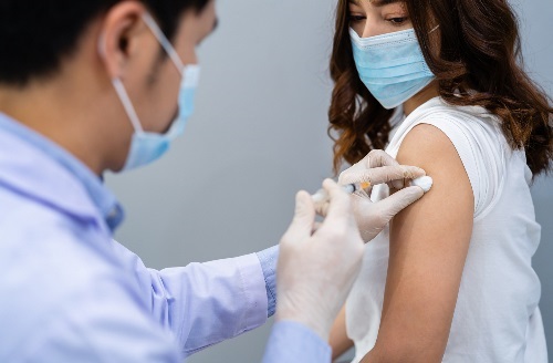 Woman getting vaccine